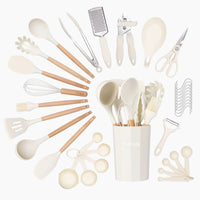 Nuovva 35pcs cream silicon utensils in.a storage holder including hooks, utensils and measuring tools.