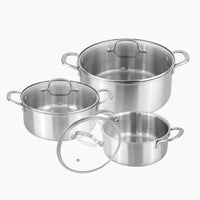 Set of 3 stainless steel casserole pots with glass lids and riveted handles.