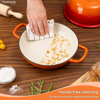 Orange enameled cast iron bread pan is easily cleaned with its scratch and stain resistant technology