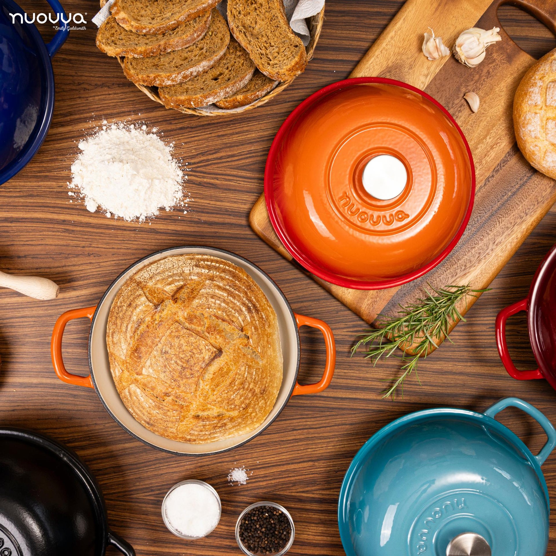 Nuovva orange cast iron bread pan with metal knob and tight-fitting lid.