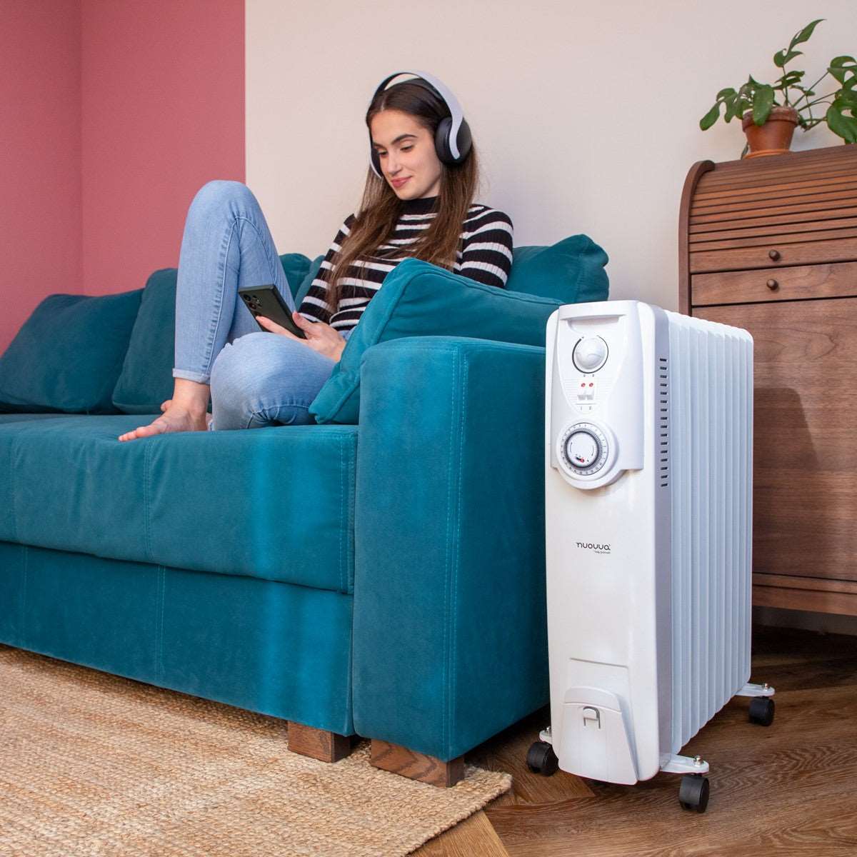 White portable radiator heater for home heating with adjustable thermostat