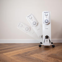 White portable heater with wheels. adjustable thermostat and anti-fall technology