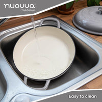 Nuovva light grey cast iron casserole pot with lid, easy to clean and manage.