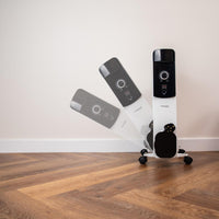 White portable heater with adjustable thermostat and anti-fall technology.