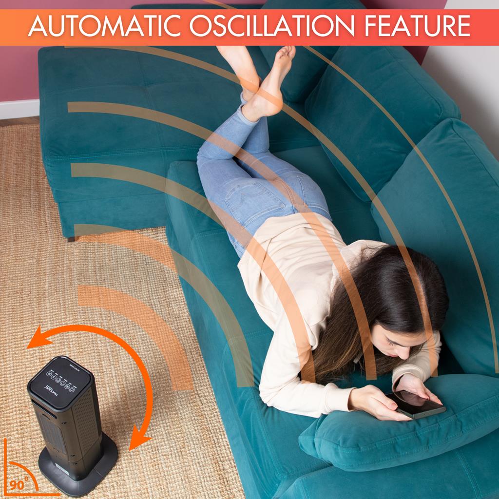 Black tower heater with oscillating feature for home heating.