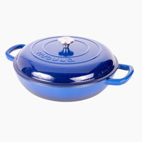 Nuovva dark blue shallow cast iron casserole pot with lid for oven safe cooking.