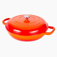 Nuovva orange cast iron casserole dish with lid for efficient induction cookware.