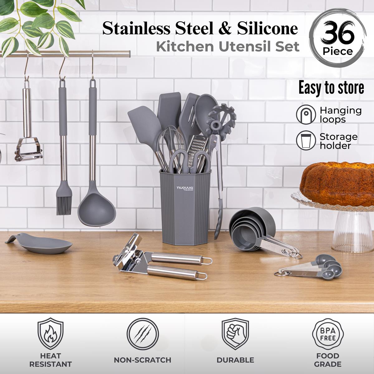 Durable, BPA free and easy to store 36-piece stainless steel and silicone kitchen utensil set includes a gray holder, measuring cups, a garlic press, peelers, spatulas, a brush, and other cooking tools.