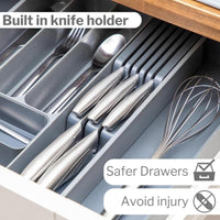 Grey adjustable cutlery organizer with built in knife holder for safer drawers to avoid injury.