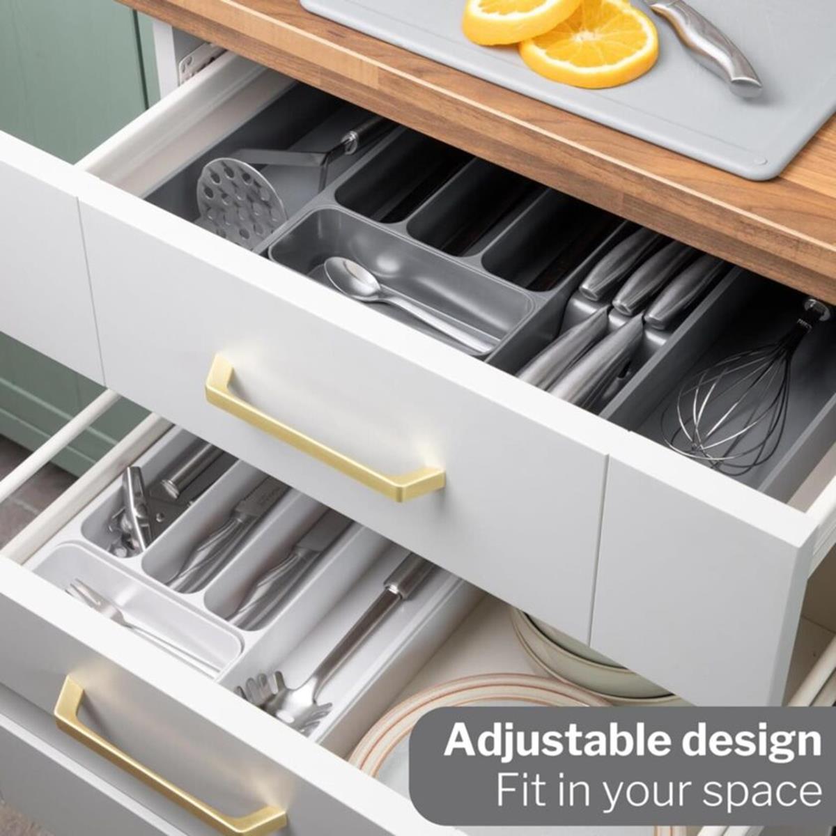 Kitchen drawer adjustable compartments for organized kitchen spaces. 