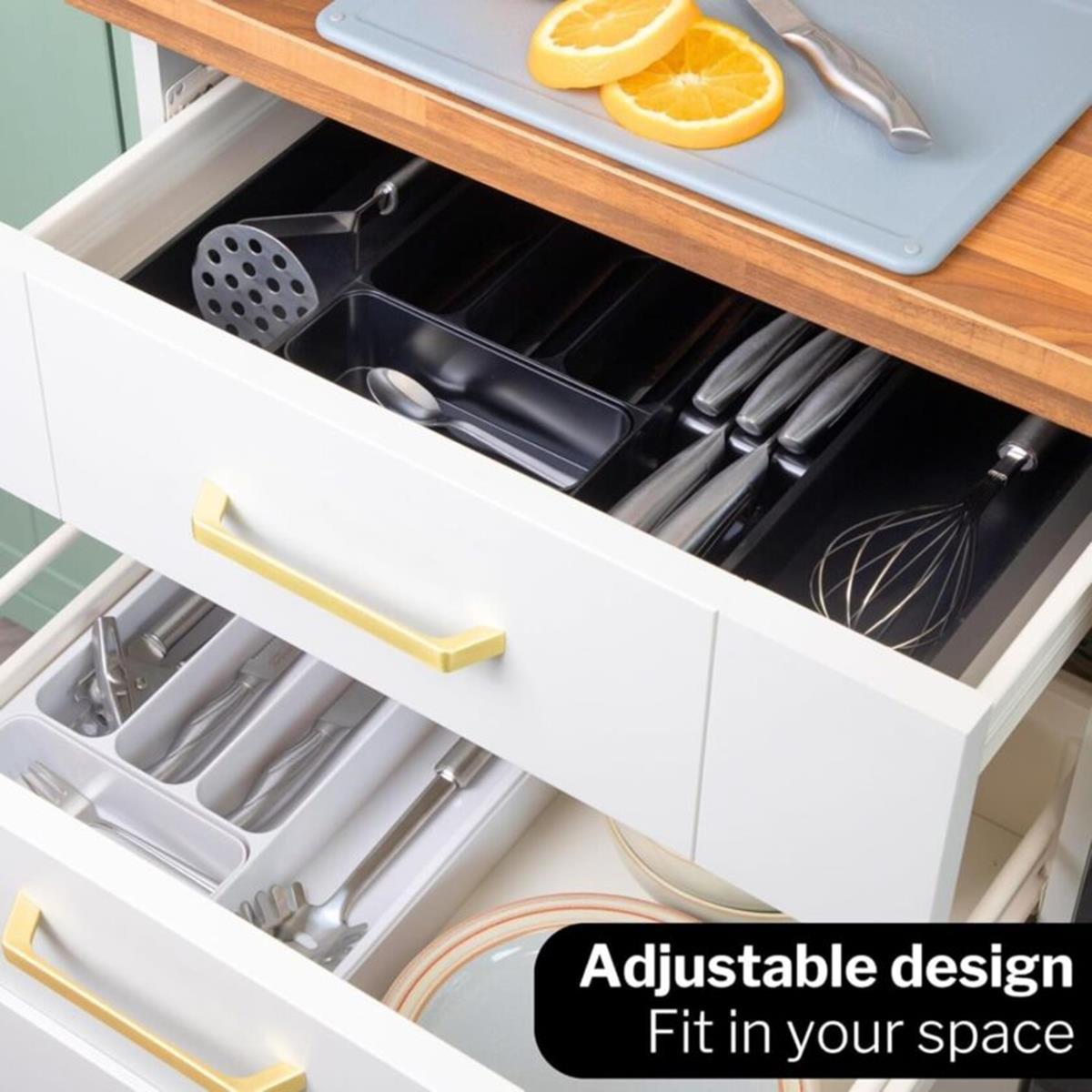 Shaded black cutlery drawer organizer with adjustable design to fit in your space. 