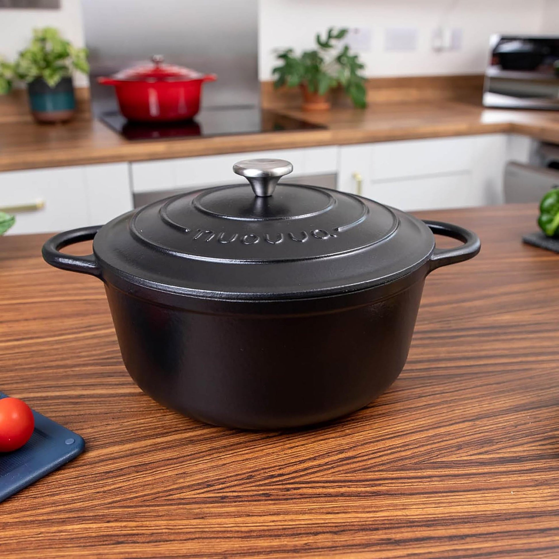 Nuovva black cast iron Dutch oven with lid and silver knob for easy home cooking