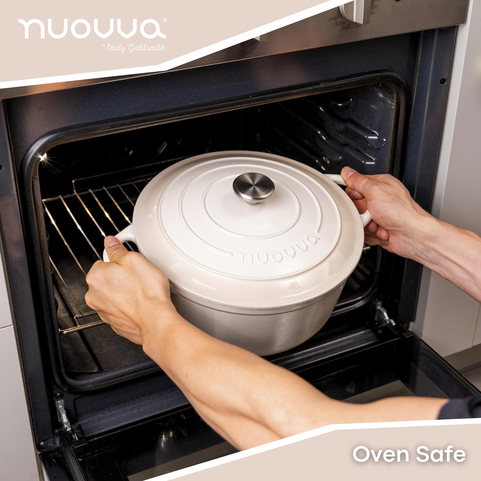 Oven safe cast iron Dutch oven in pastel shade with metal knob. 