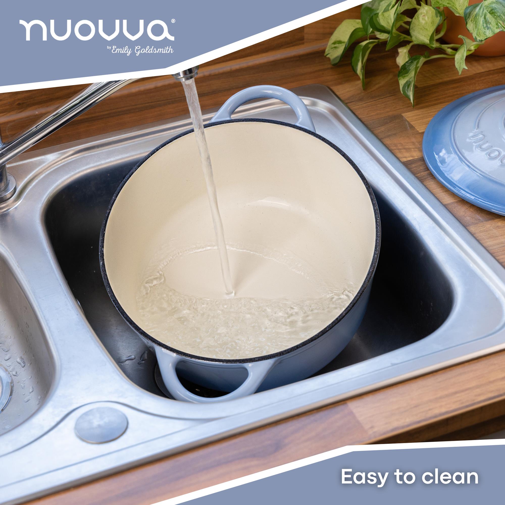 Nuovva easy to clean cast iron Dutch oven casserole pot with lid and cream interior. 