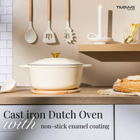 Nuovva cream cast iron Dutch oven with non-stick enamel coating and gold knob with matching cooking utensils. 