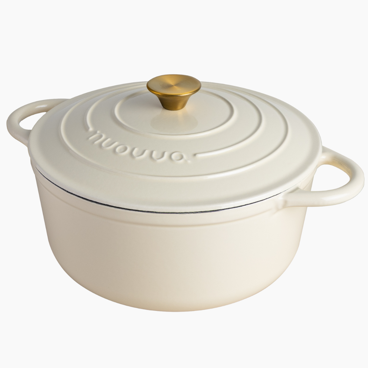 cream enameled cast iron Dutch oven with a gold lid knob by nuovva