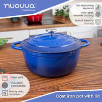 Nuovva dark blue oven safe cast iron pot with lid, induction compatible base and non-stick enamel coating. 