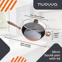 Copper colored 28cm sauté pan with lid on a kitchen counter with measurements displayed.