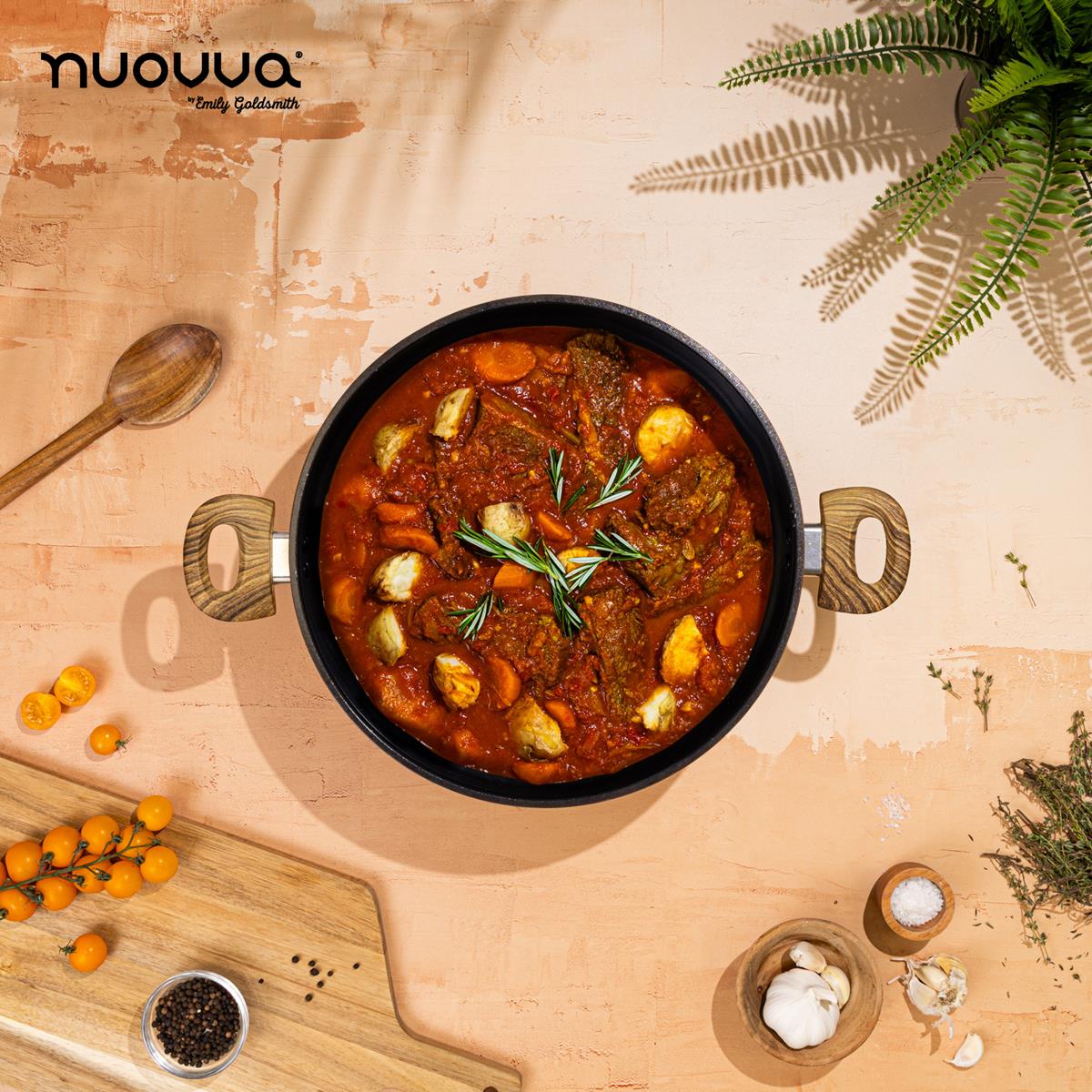nuovva copper stockpot with wooden handles for easy home cooking.