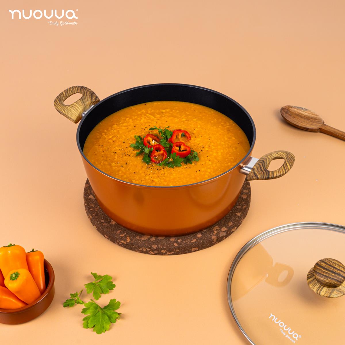 nuovva copper stockpot with glass lid and wooden handles for easy cooking. 