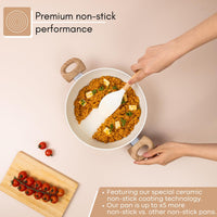 Cream granite casserole pot with ceramic coating for premium non-stick performance. 