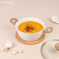 Nuovva cream cooking pot with wooden handles and glass lid. 