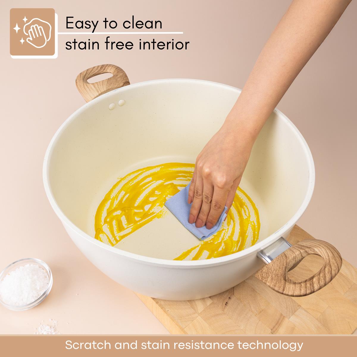 Easy to clean cream stockpot with stain free interior and scratch resistant technology
