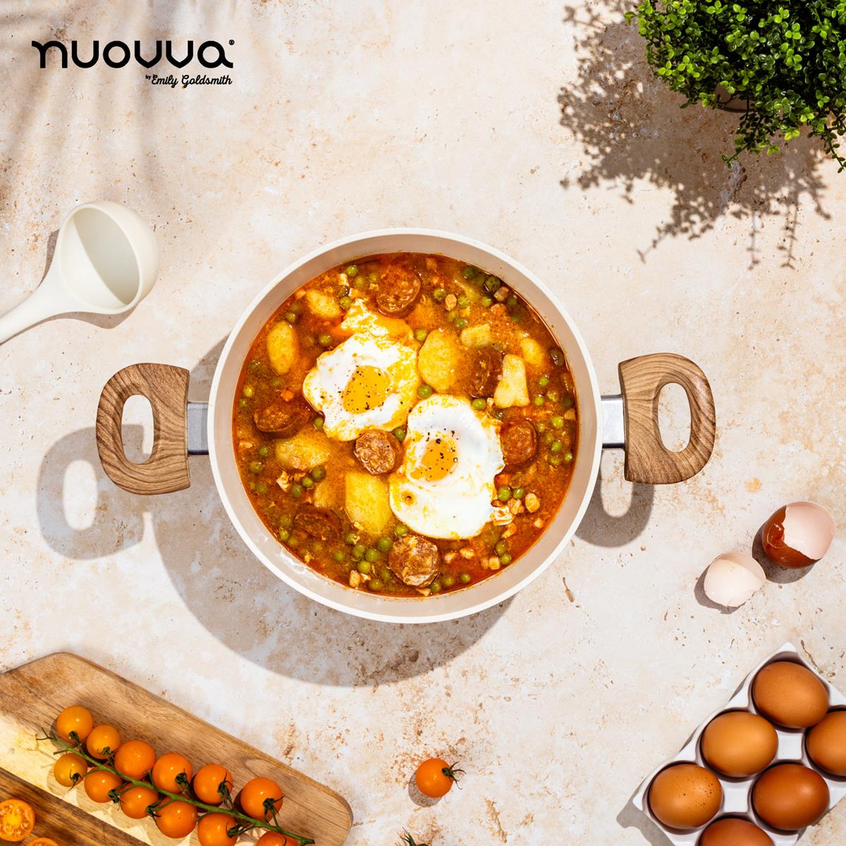 Nuovva cream stockpot with wooden handles for easy home cooking. 