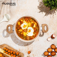 Nuovva cream stockpot with wooden handles for easy home cooking. 