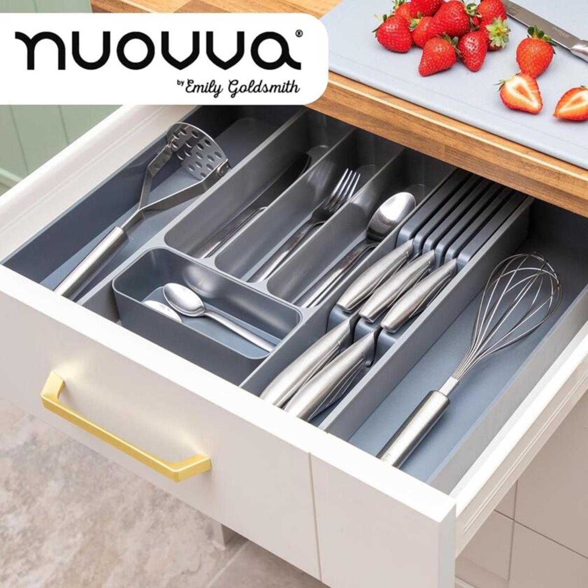 Light grey cutlery drawer organizer with slotted knife compartments for organized kitchens.