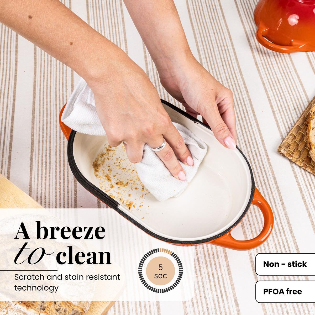 Orange easy to clean cast iron loaf pan, with non-stick interior 