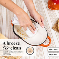 Orange easy to clean cast iron loaf pan, with non-stick interior 