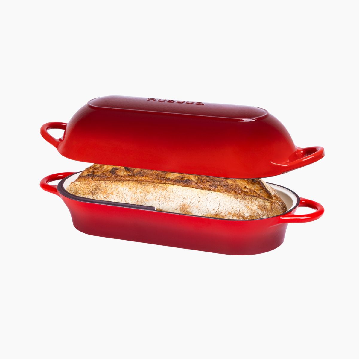 Red enameled cast iron bread pan with lid containing home baked bread. 