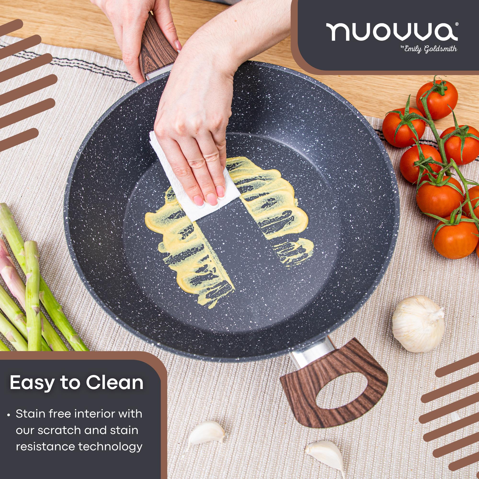 Person cleaning a non-stick easy to clean sauté pan with scratch and stain resistant technology