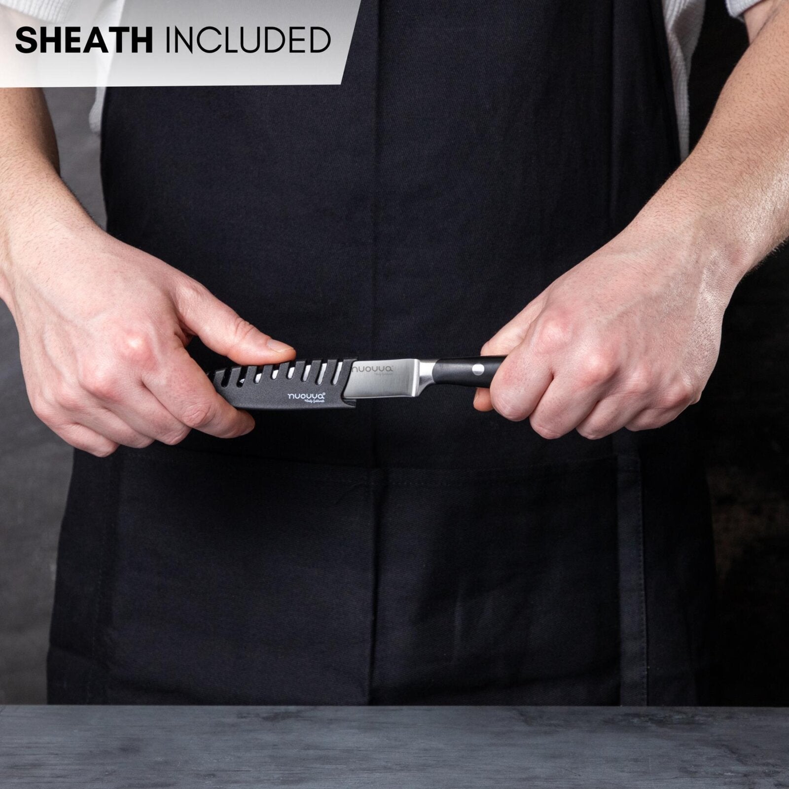Nuovva stainless steel kitchen knife with protective sheath. 