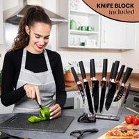 Cook using Nuovva kitchen knife with knife block included, vegetable peeler and cooking scissors