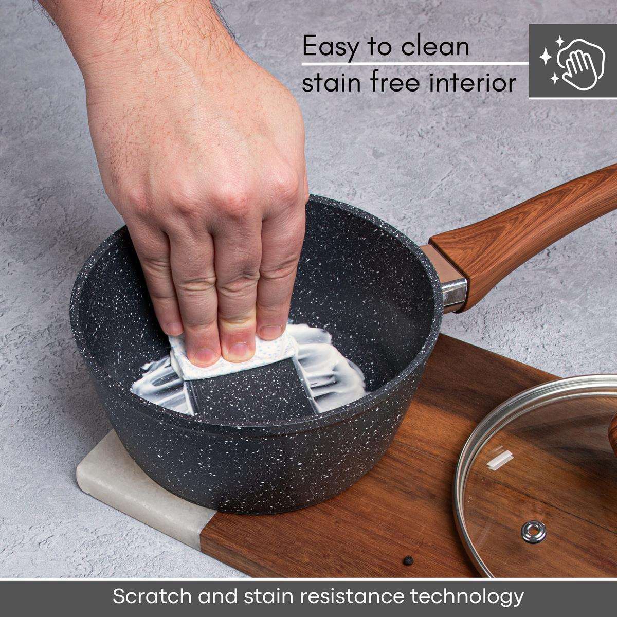 Easy to clean grey granite saucepan with wooden handle and glass lid. 