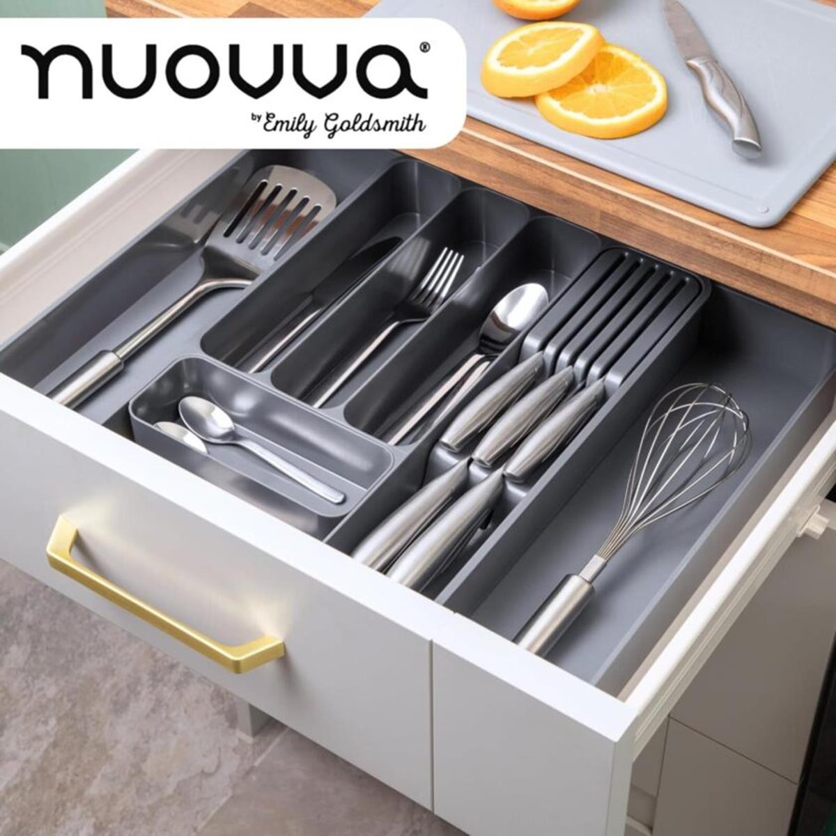 Knife and cutlery organizer in a kitchen drawer for easy home organization. 