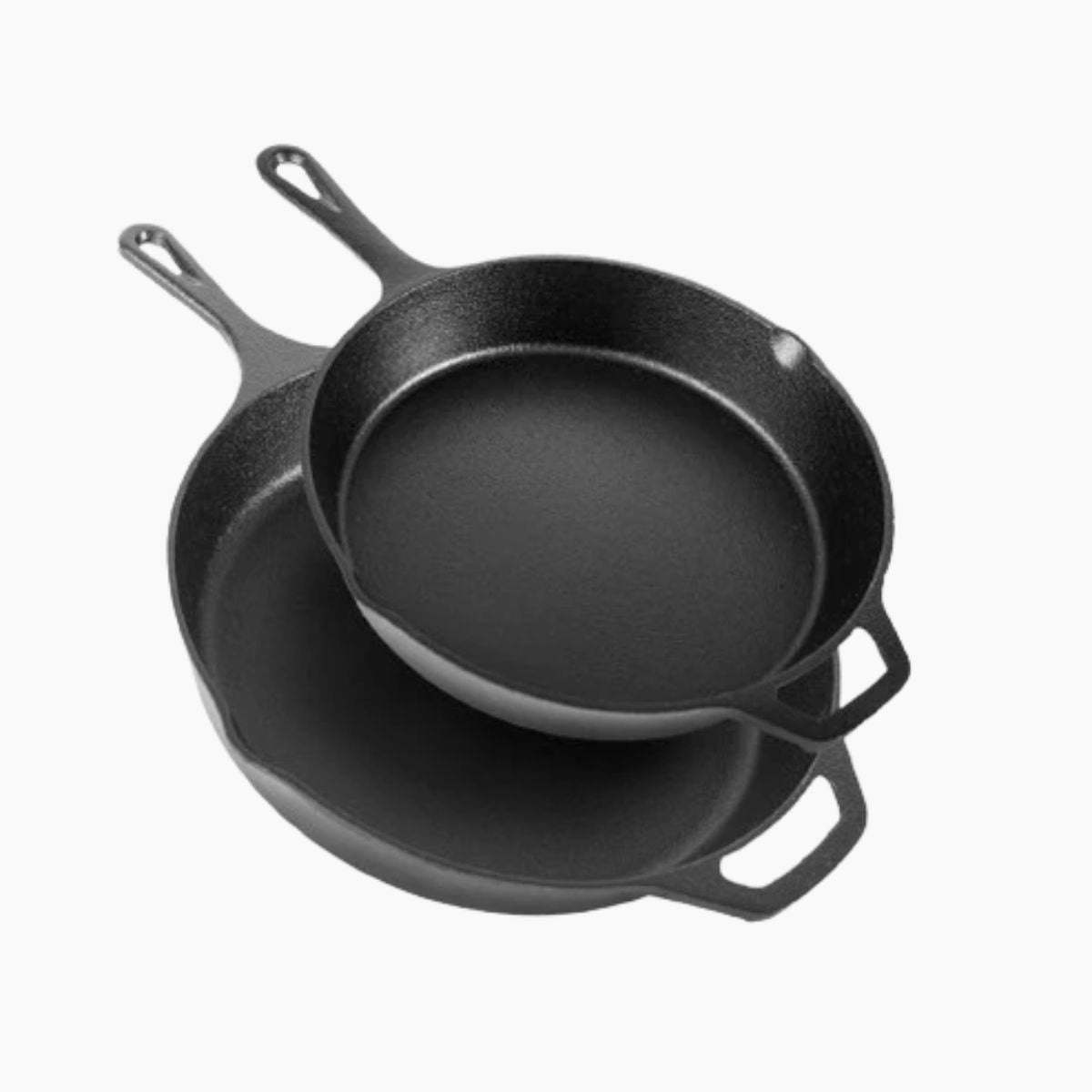 Set of two black pre-seasoned cast iron skillets set frying pans. 
