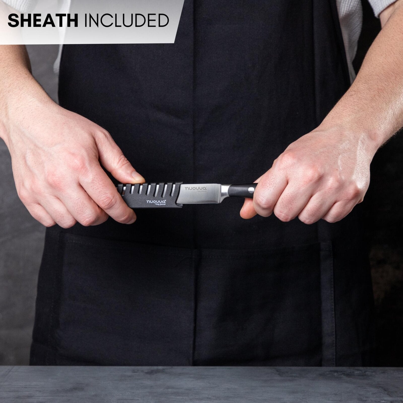 Stainless steel kitchen utility knife with protective sheath. 
