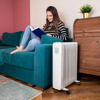 Oil filled portable radiator heater for efficient home heating. 