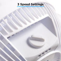 White portable electric desk fan with 3 speed settings and turn dial. 